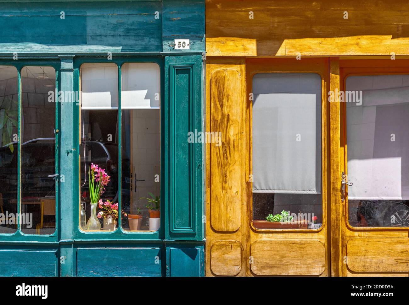 Two old shop windows now domestic living accommodation - Loches, Indre-et-Loire (37), France. Stock Photo