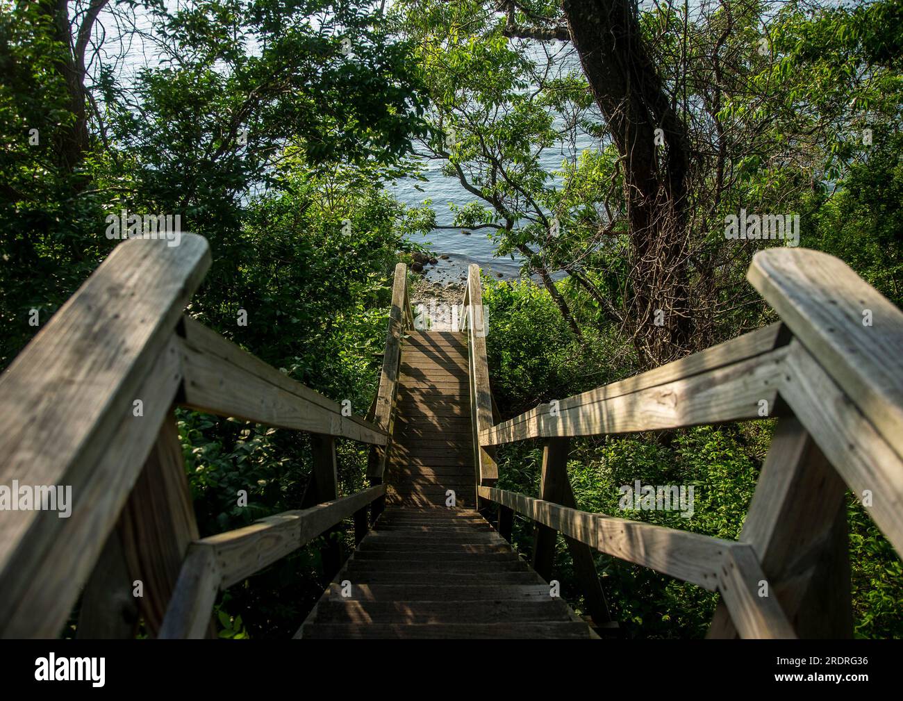 A steep staircase leading to a beach on the Long Island Sound Stock Photo