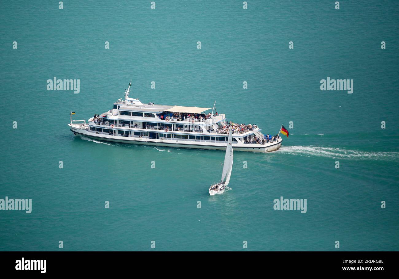 Konstanz, Germany. 23rd July, 2023. A sailboat and the fully crewed ...