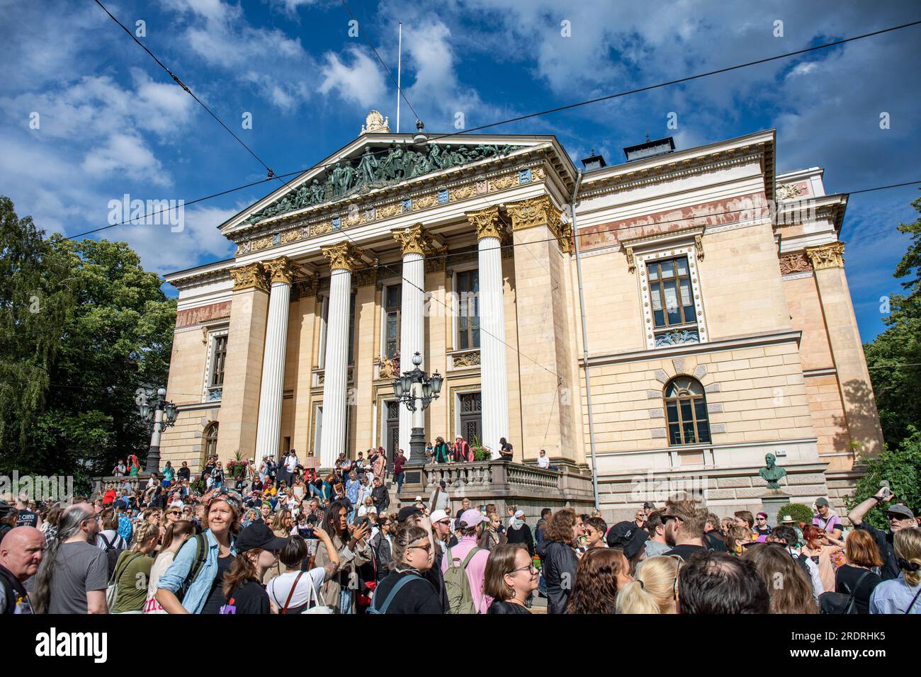 People gathering in front of Säätytalo before Nollatoleranssi! demonstration against far-right ministers in right-wing coalition government of Finland Stock Photo