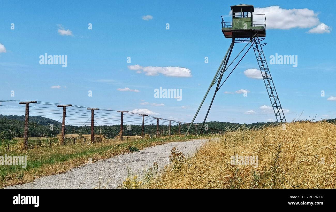 Historical watchtower as a remain of the Cold War Iron Curtain monument