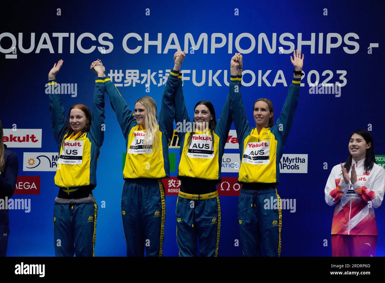 Australian team celebrates during medal ceremony after making world