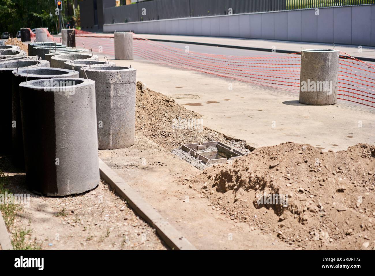Laying concrete manholes and drain pipes for stormwater system