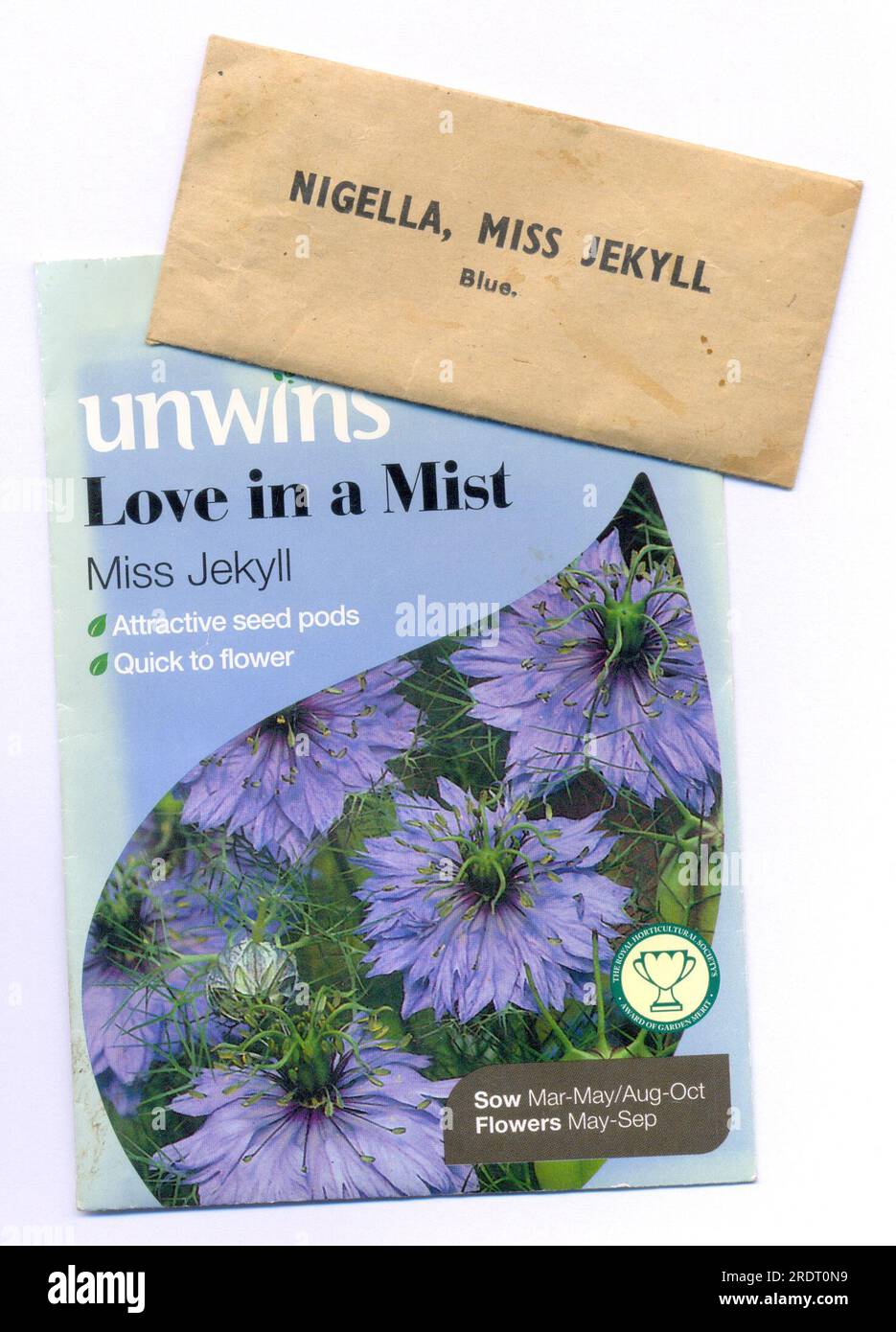Seed packets  for Nigella damascena, Love in a Mist, Miss Jekyll 1912 and 2012 Stock Photo