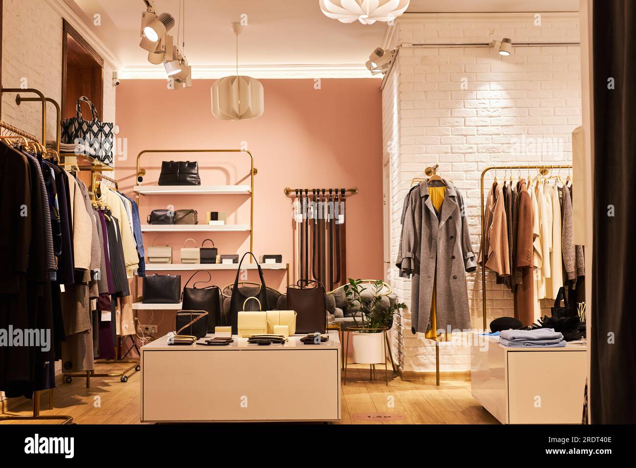 Background image of elegant clothing boutique interior with