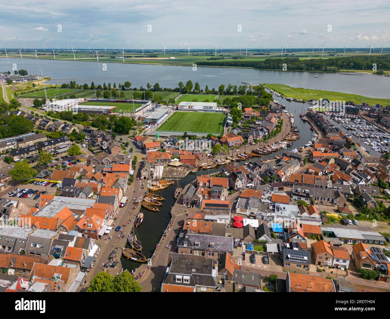 Aerial drone photo of Bunschoten and Spakenburg in the Netherlands. Spakenburg has an old town centre with a harbor and old sailing boats Stock Photo