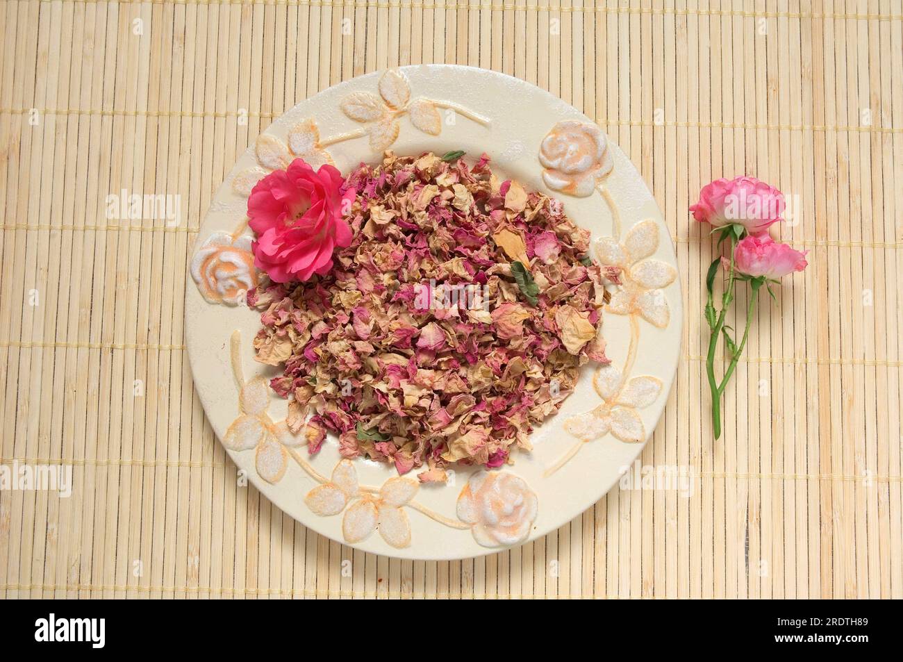 Dried rose petals in the bowl Stock Photo - Alamy