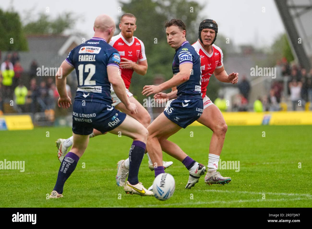 Leeds, UK. 23rd July 2023. Betfred Challenge Cup Semi Final: Hull KR v Wigan Warriors. Brad Schneider of Hull KR kicks the ball through a gap in the defence of Wigan. Credit Paul Whitehurst/Alamy Live News Stock Photo