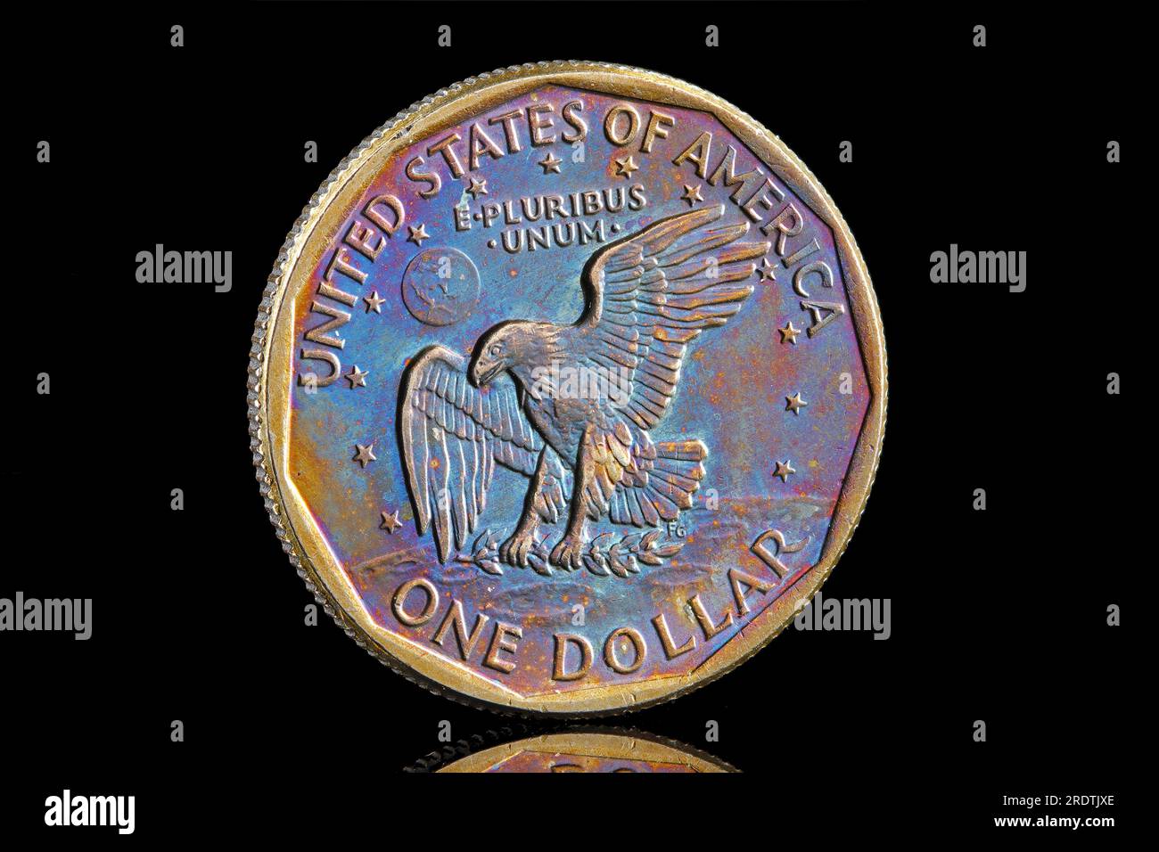 1979 One Dollar coin with rainbow toning. The design is that of the ...