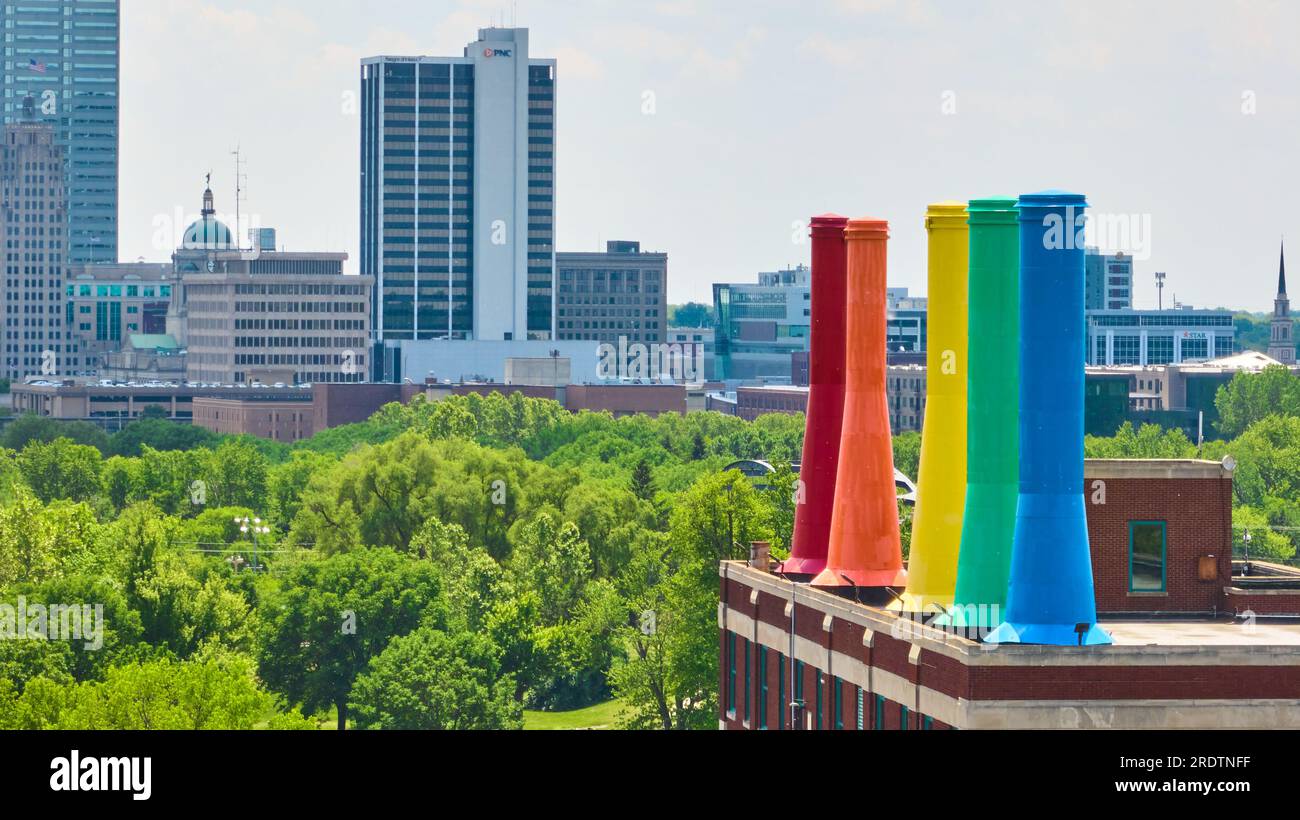 Aerial Science Central rainbow smokestacks with downtown Fort Wayne