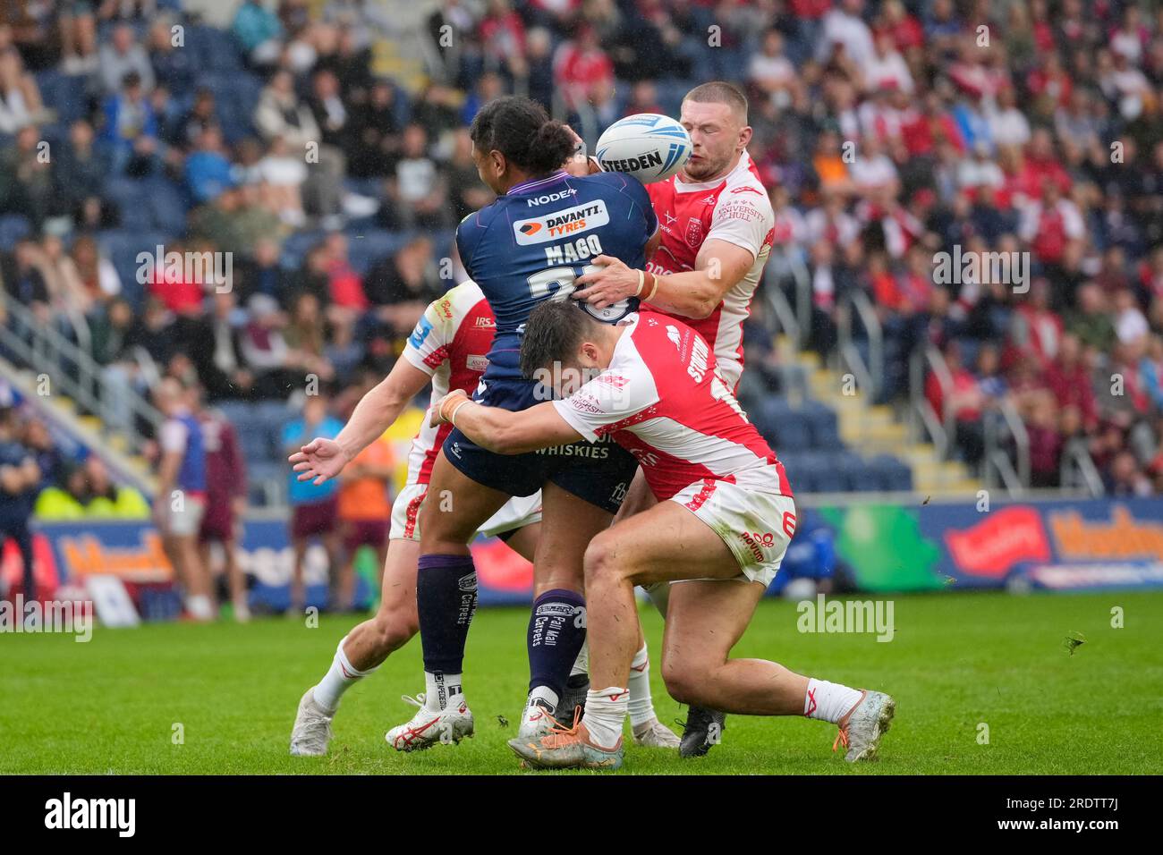 Matty Storton #17 of Hull KR  and James Batchelor #16 of Hull KR force a loose carry by Patrick Mago #20 of Wigan Warriors during the Betfred Challenge Cup Semi Final match Hull KR vs Wigan Warriors at Sewell Group Craven Park, Kingston upon Hull, United Kingdom, 23rd July 2023  (Photo by Steve Flynn/News Images) Stock Photo