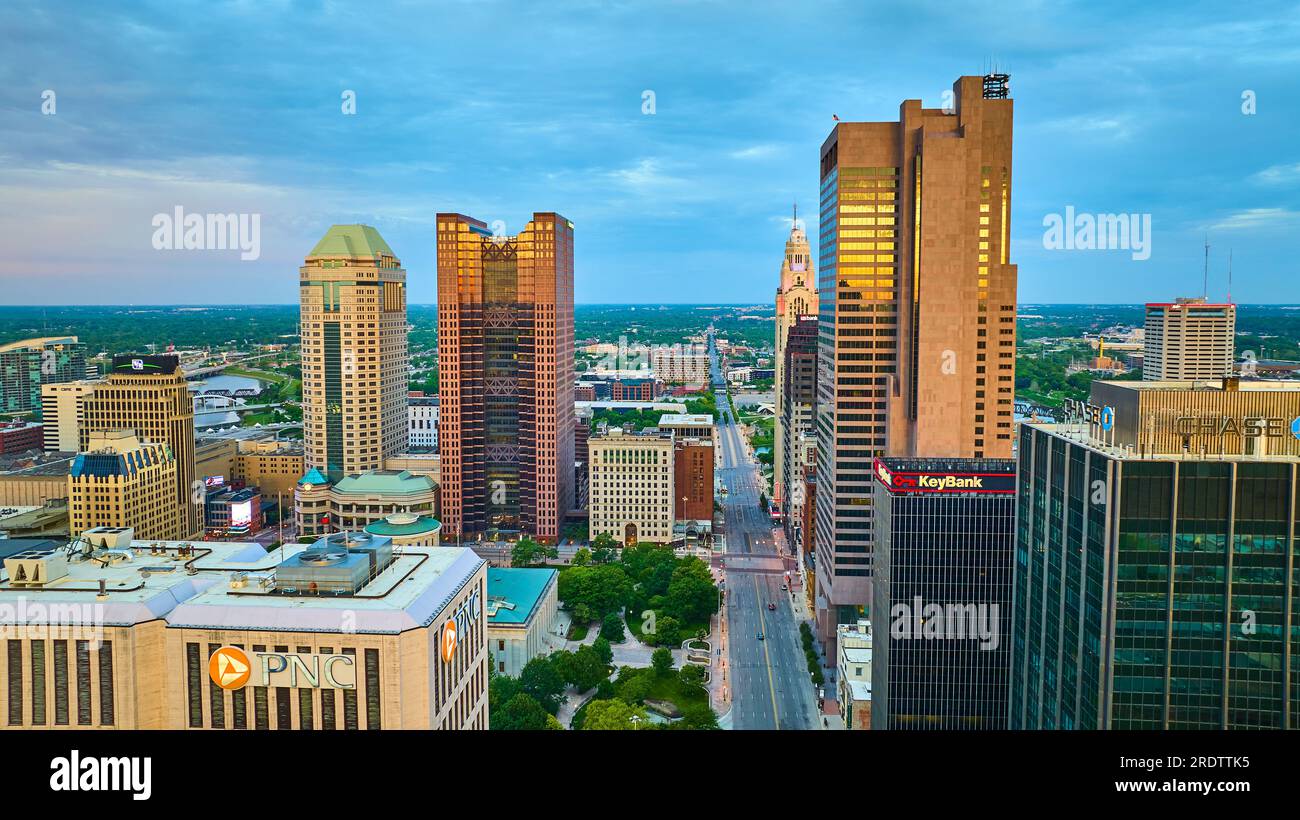 golden sunrise glinting off office windows in heart of