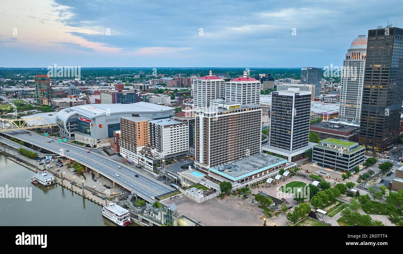 Pink blue sky over downtown city Louisville Kentucky aerial showing