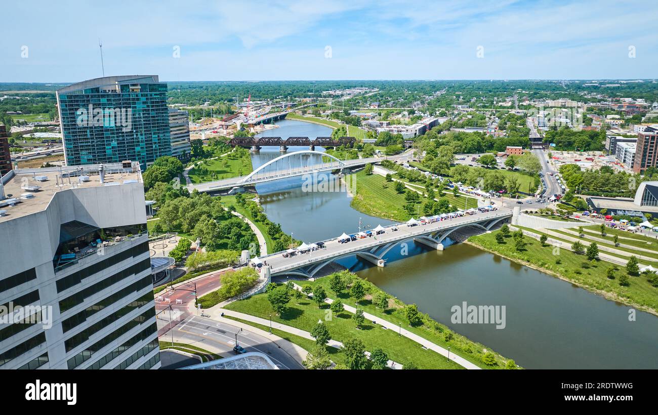 Tents on bridge over Scioto River aerial downtown buildings from Columbus Ohio Stock Photo