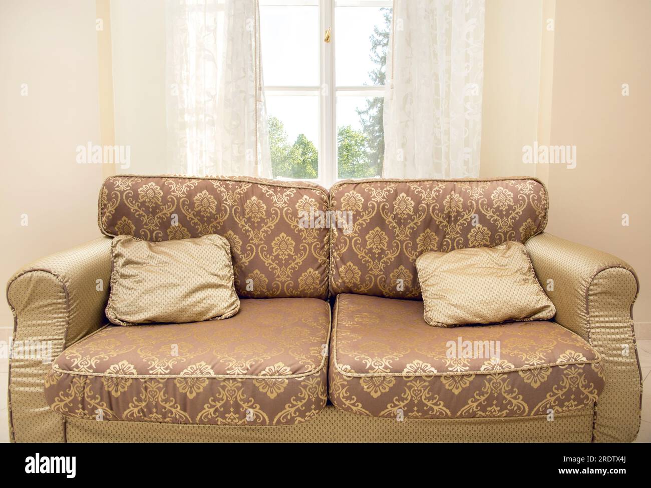 elegant luxury sofa in front of the window Stock Photo Alamy