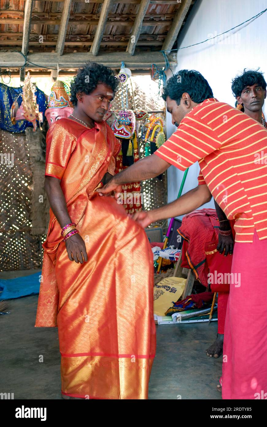 Man wearing saree in wedding hotsell