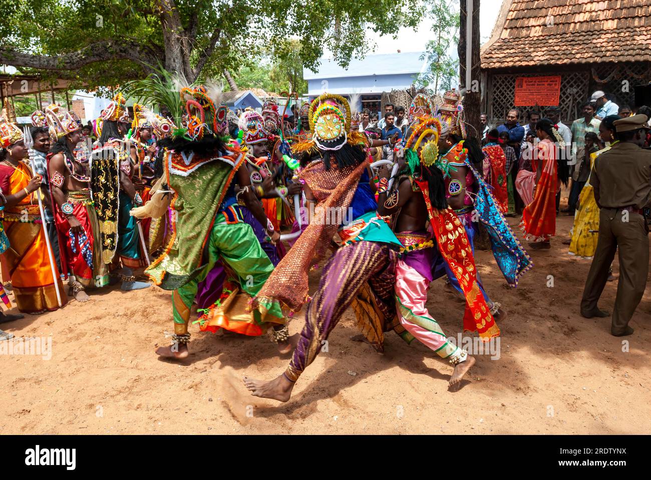 Dancing Men wearing exaggerate costumes for the purpose of offering