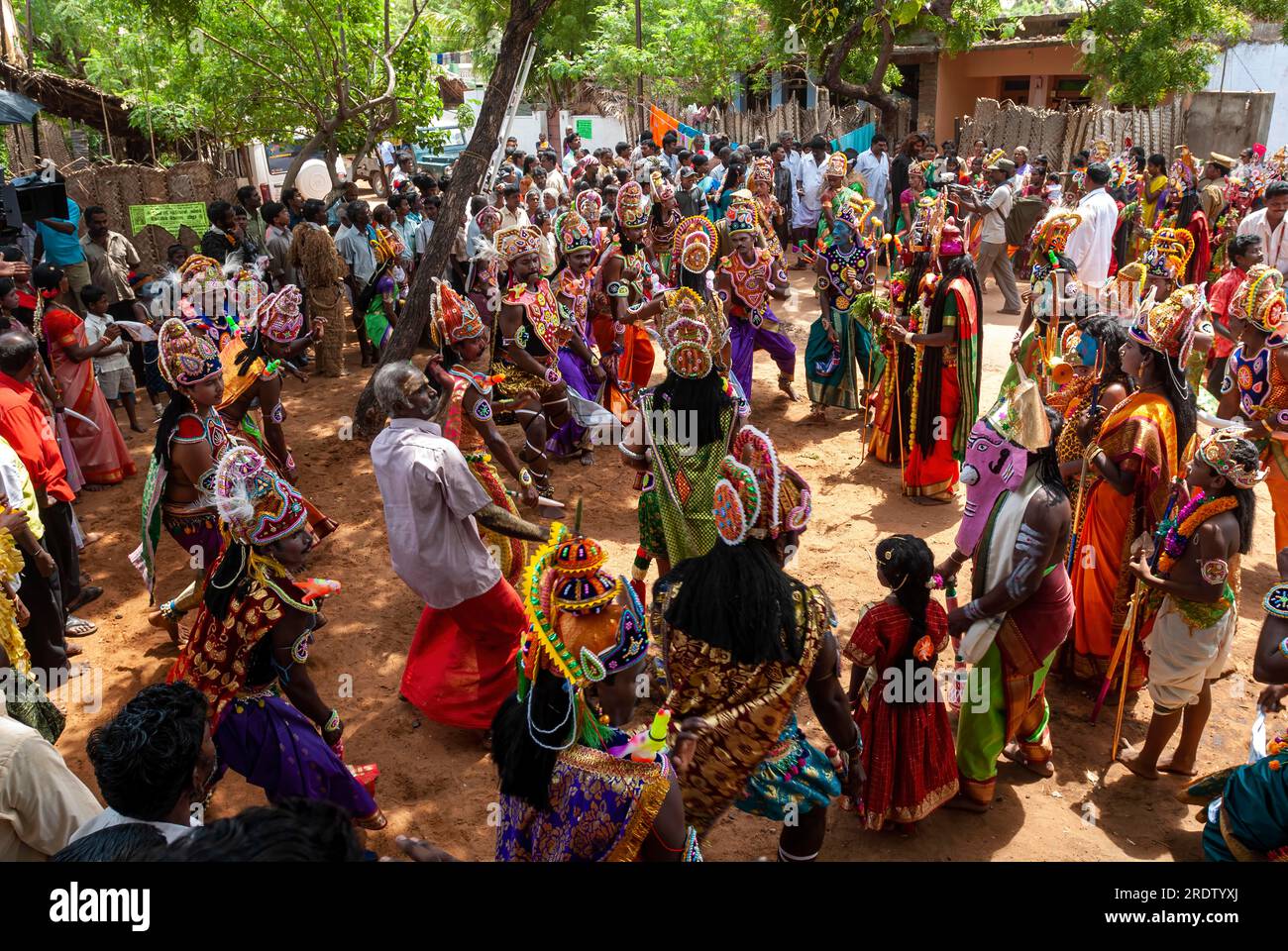 Dancing Men wearing exaggerate costumes for the purpose of offering