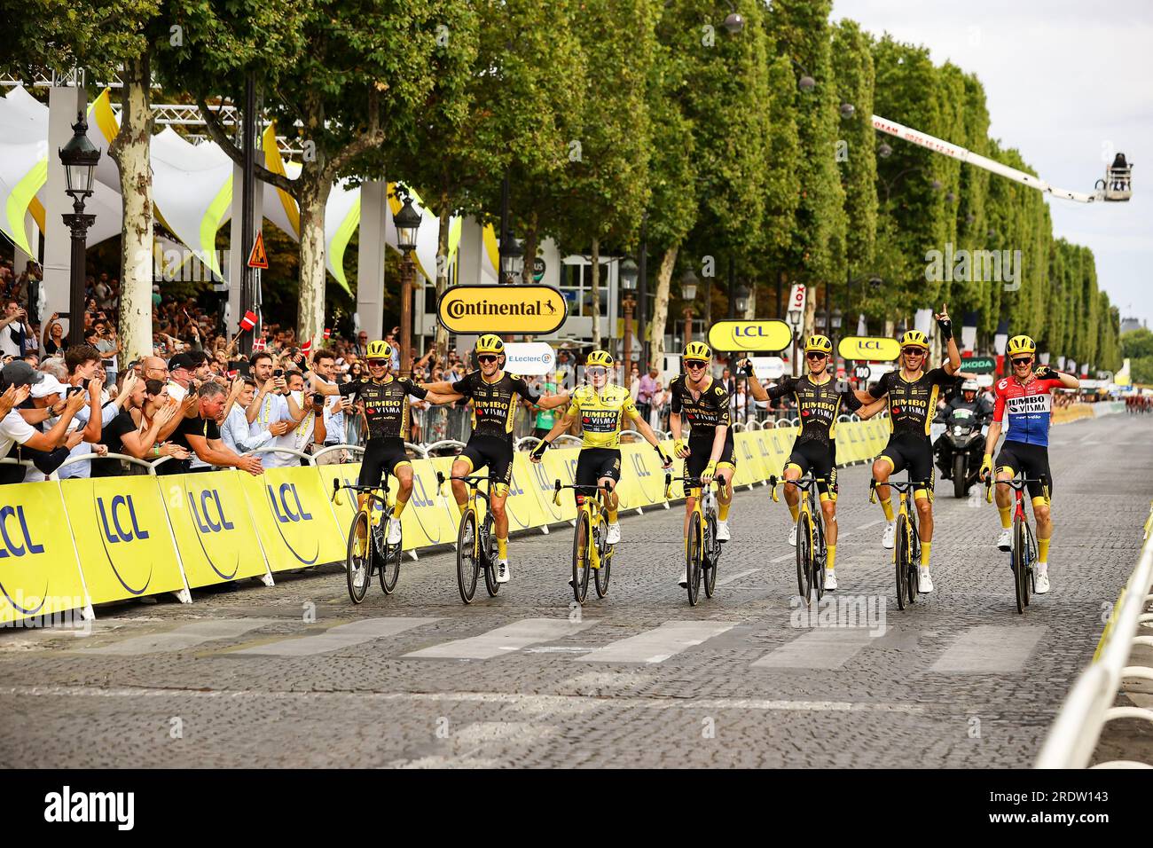 Paris, France. 23rd July, 2023. Danish Jonas Vingegaard of Jumbo-Visma and his teammates cross the finish line of the 21st and last stage of the Tour de France cycling race, from Saint-Quentin-en-Yvelines to Paris, France, Sunday 23 July 2023. This year's Tour de France takes place from 01 to 23 July 2023. BELGA PHOTO DAVID PINTENS Credit: Belga News Agency/Alamy Live News Stock Photo