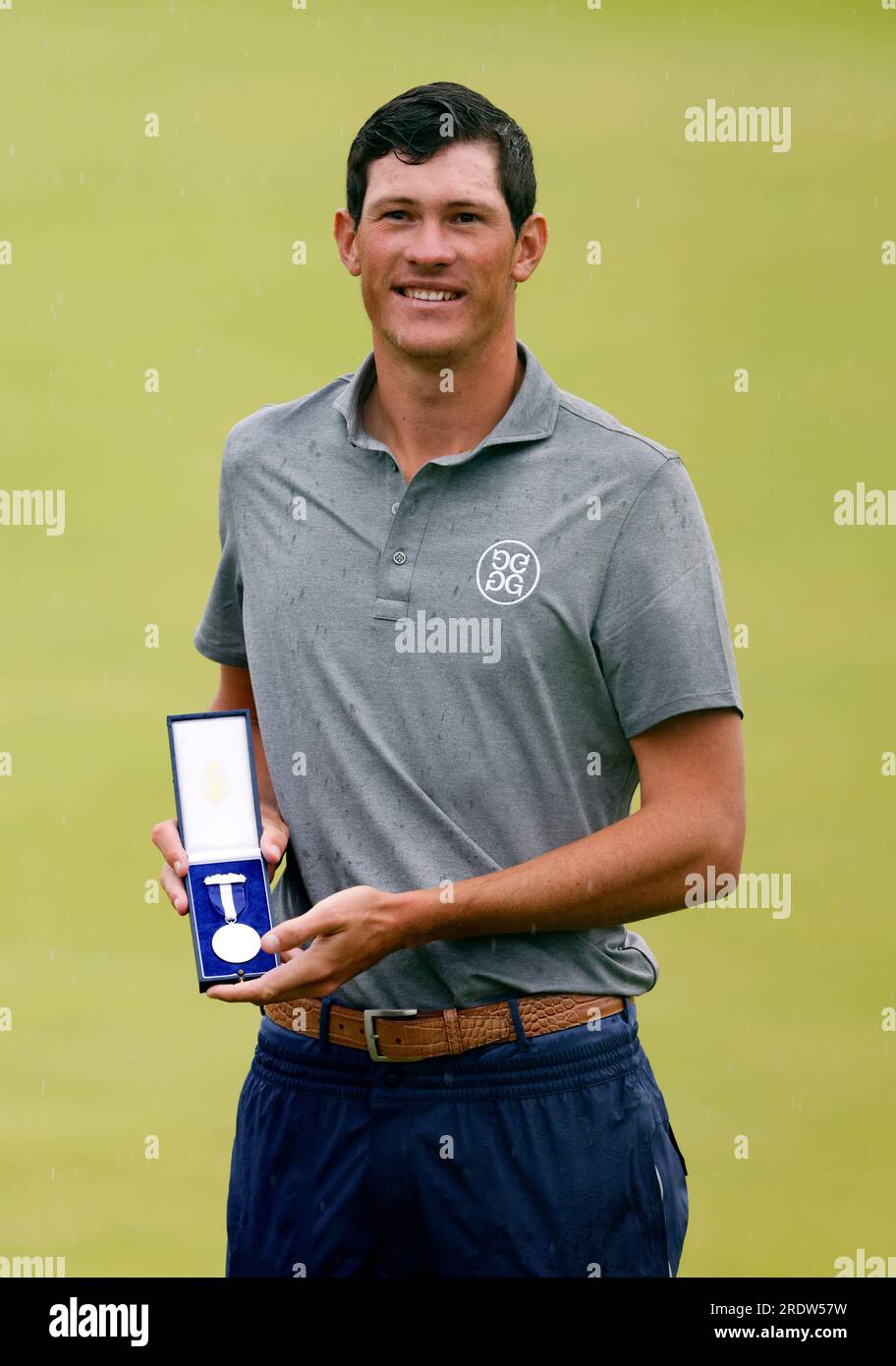 South Africa’s Christo Lamprecht with the Silver Medal awarded to the leading amateur at The Open at Royal Liverpool, Wirral. Picture date: Sunday July 23, 2023. Stock Photo