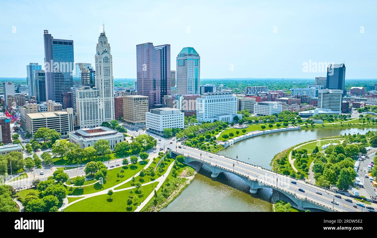 Green parks and bridge with downtown view of Columbus Ohio aerial Stock Photo
