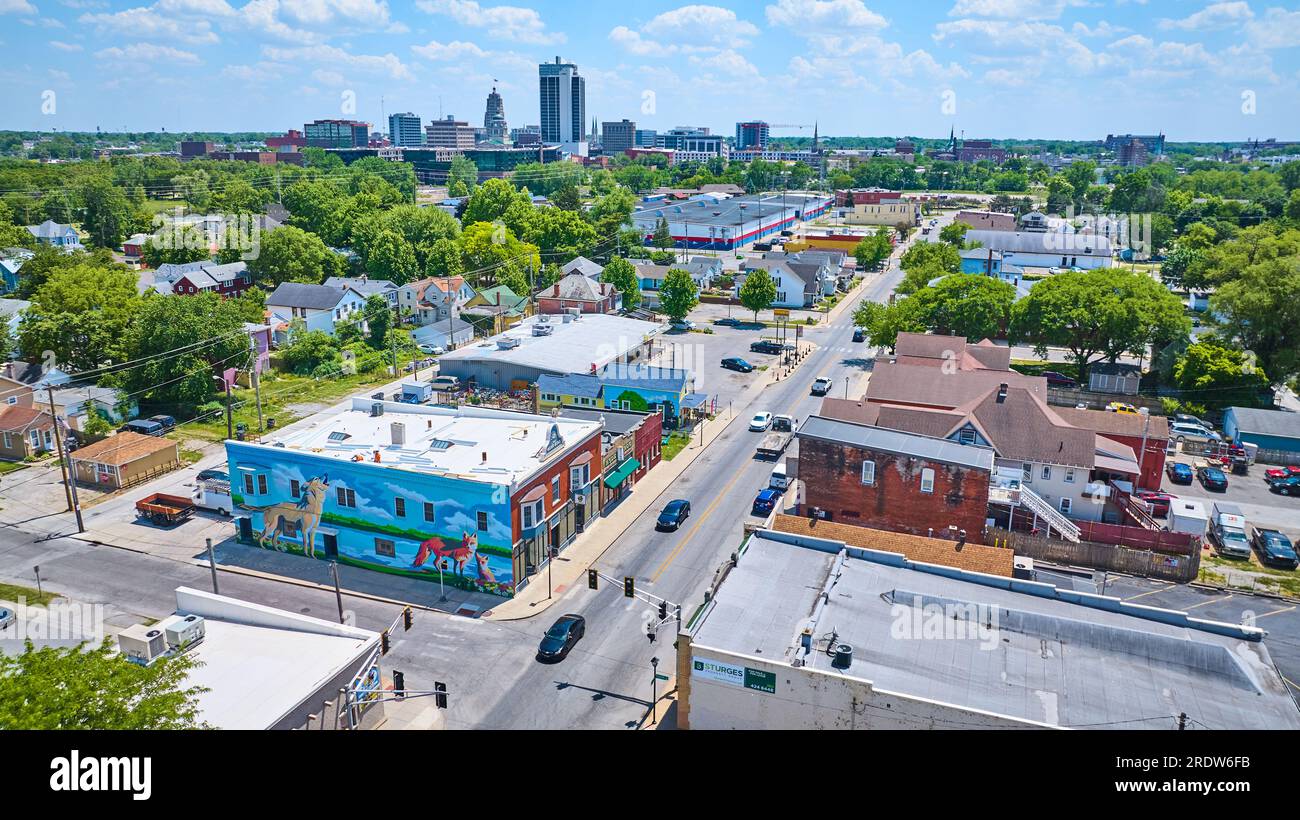 Wells Street downtown Fort Wayne fox and wolf mural on side of building