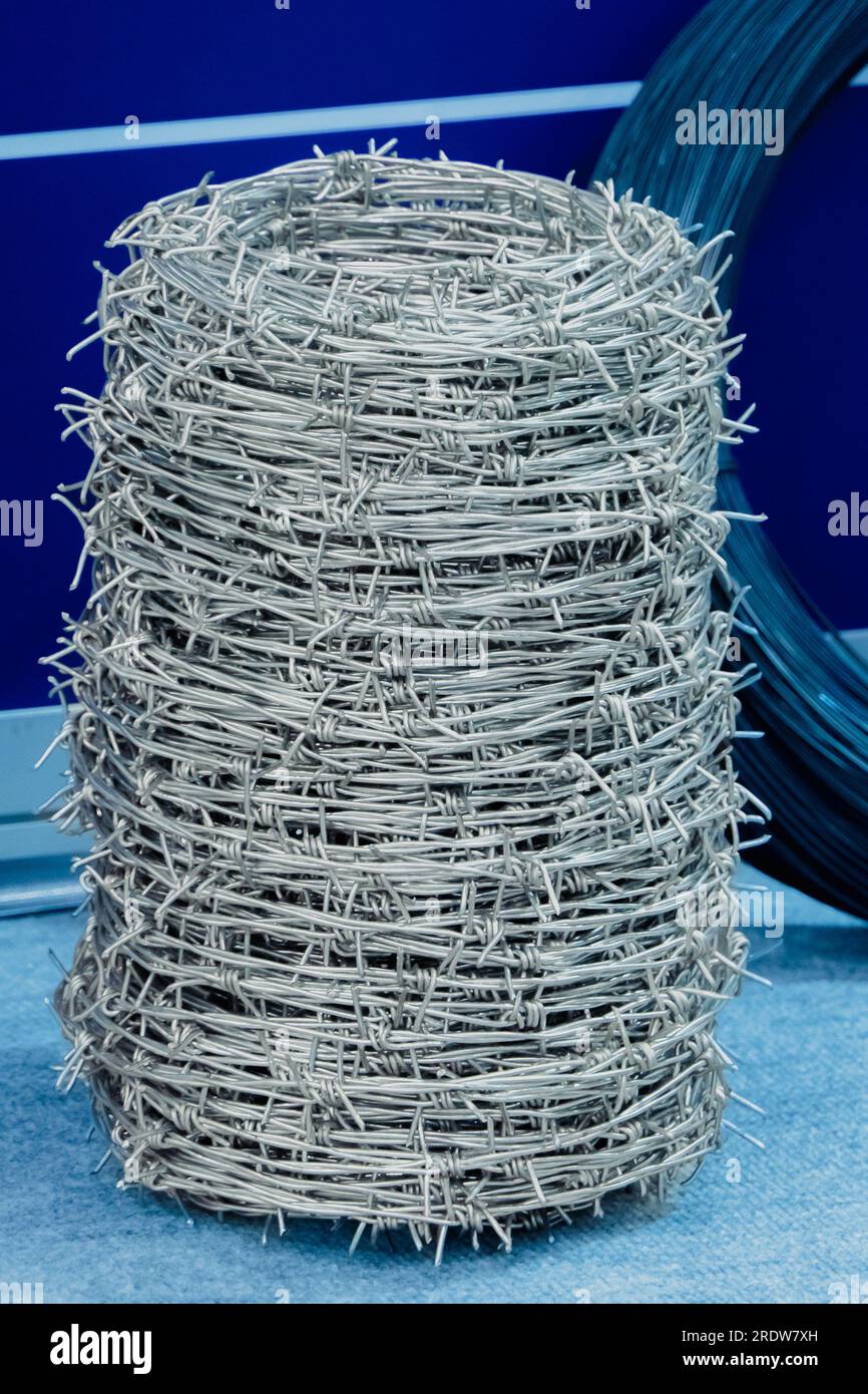 Coil of iron barbed wire Stock Photo Alamy