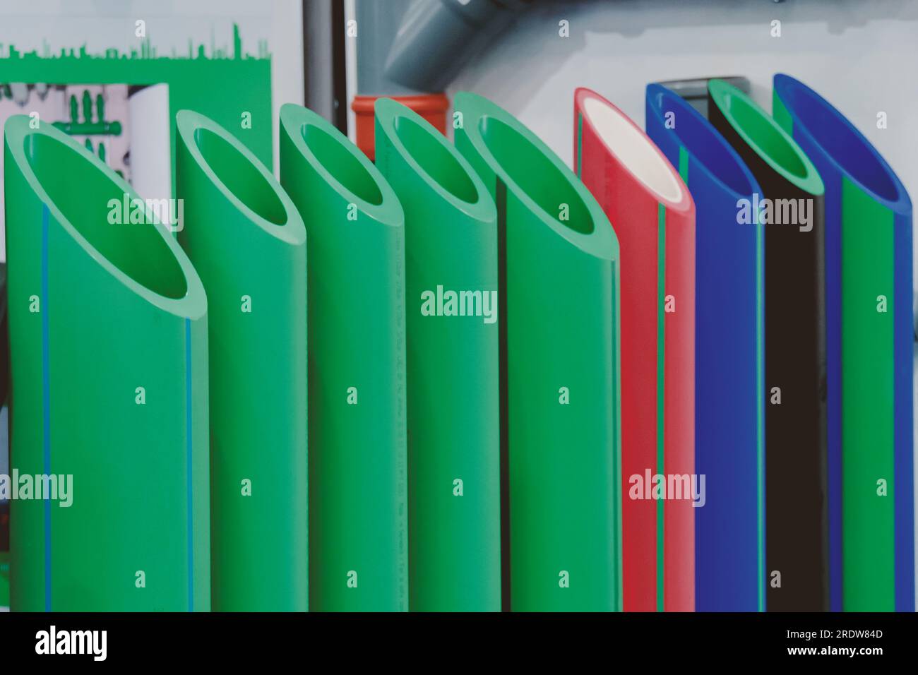 A set of PVC pipes in different colors. Cut PVC pipe Stock Photo Alamy