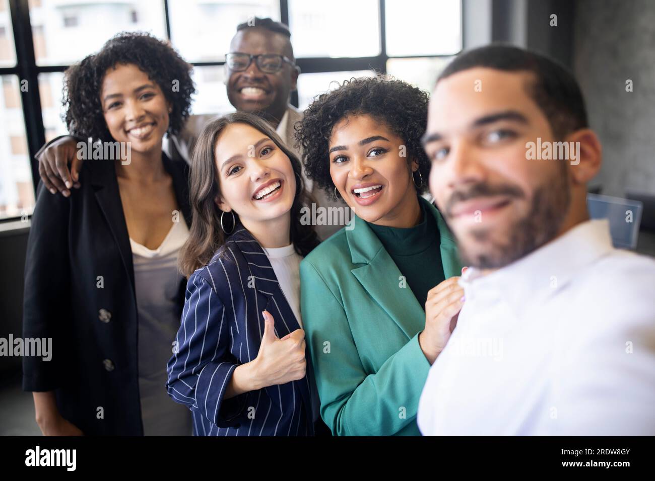 Five colleagues posing hi-res stock photography and images - Alamy