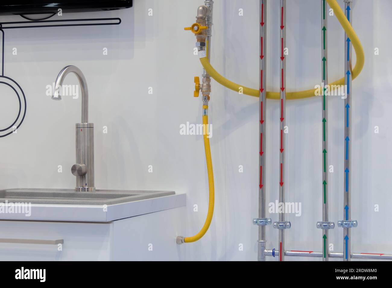 Home heating and water heating system. Double boiler. Connecting pipes to the heating boiler Stock Photo