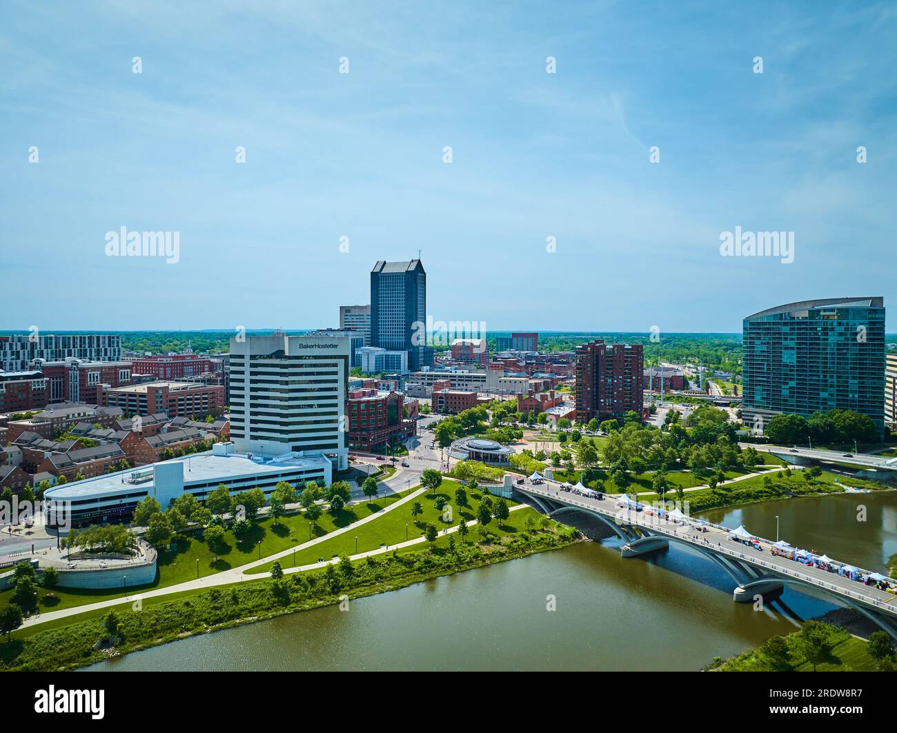 Downtown Columbus Ohio with bridge and river leading away from heart of city aerial Stock Photo