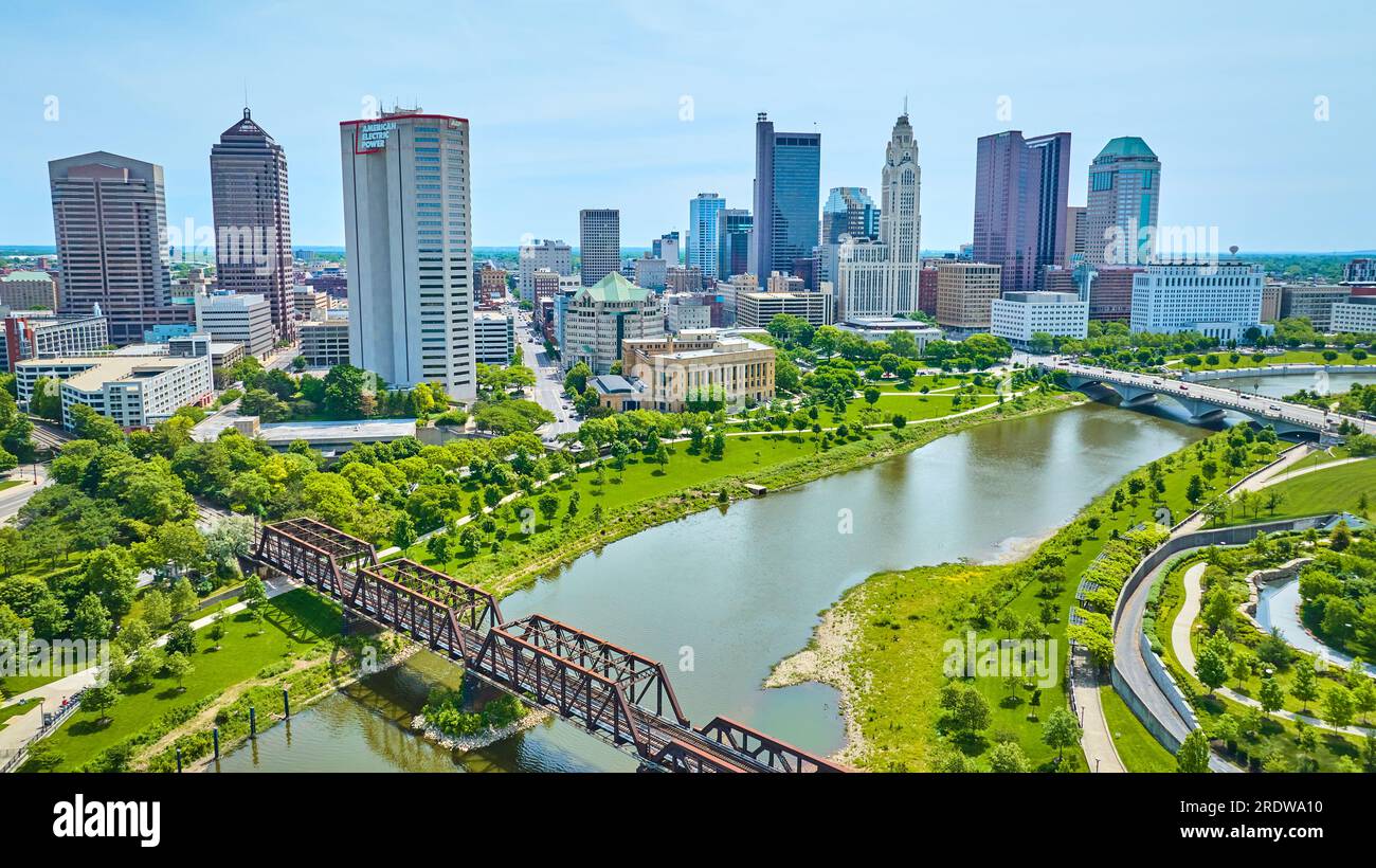 Aerial sky view downtown Columbus Ohio with train bridge over Scioto River Stock Photo