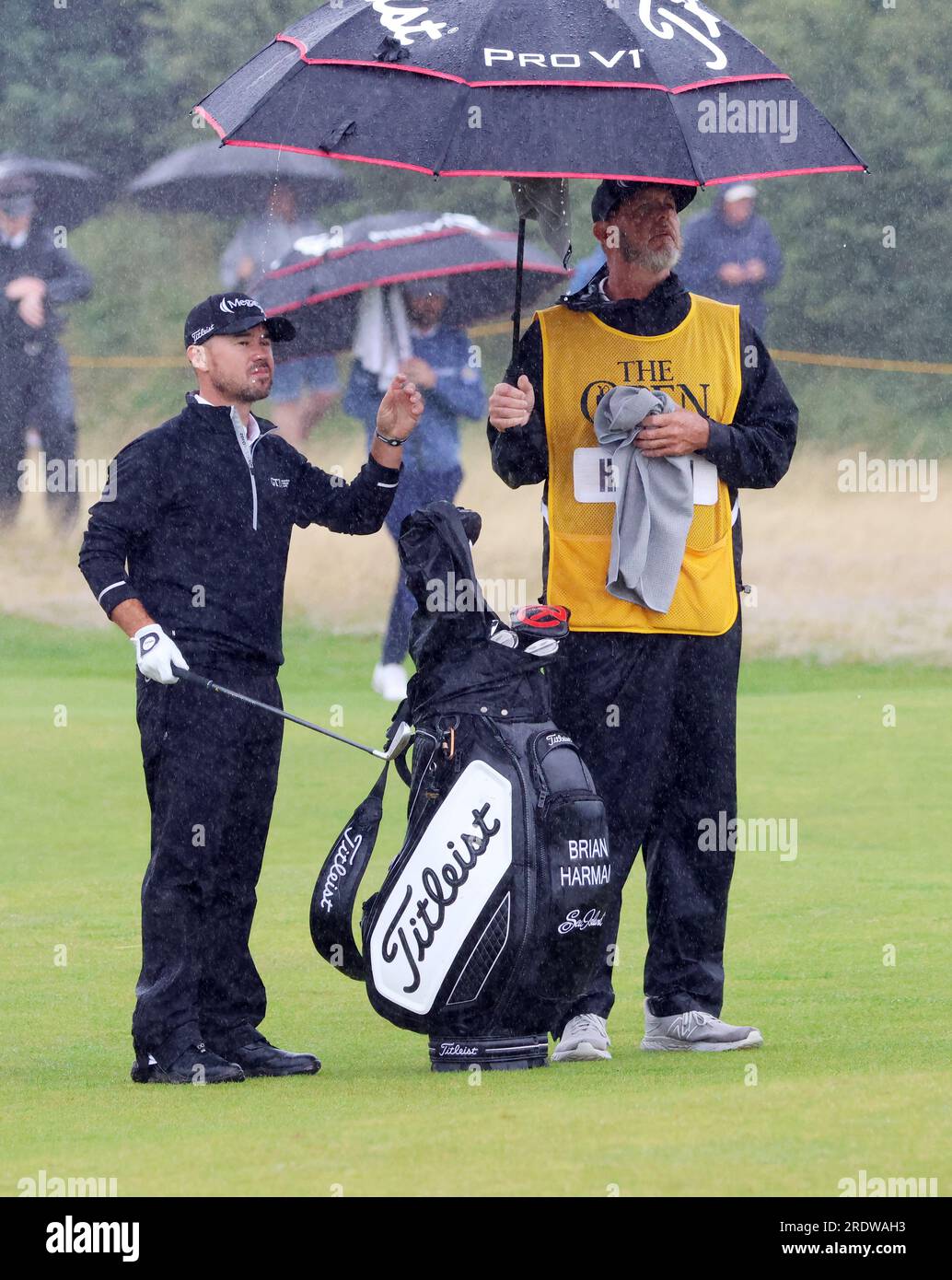 Hoylake, UK. 23rd July, 2023. American Brian Harman shelters from the rain on the fourth day at the 151st Open Championship at Royal Liverpool Golf Club in Hoylake, England on Sunday, July 23, 2023. Photo by Hugo Philpott/UPI Credit: UPI/Alamy Live News Stock Photo