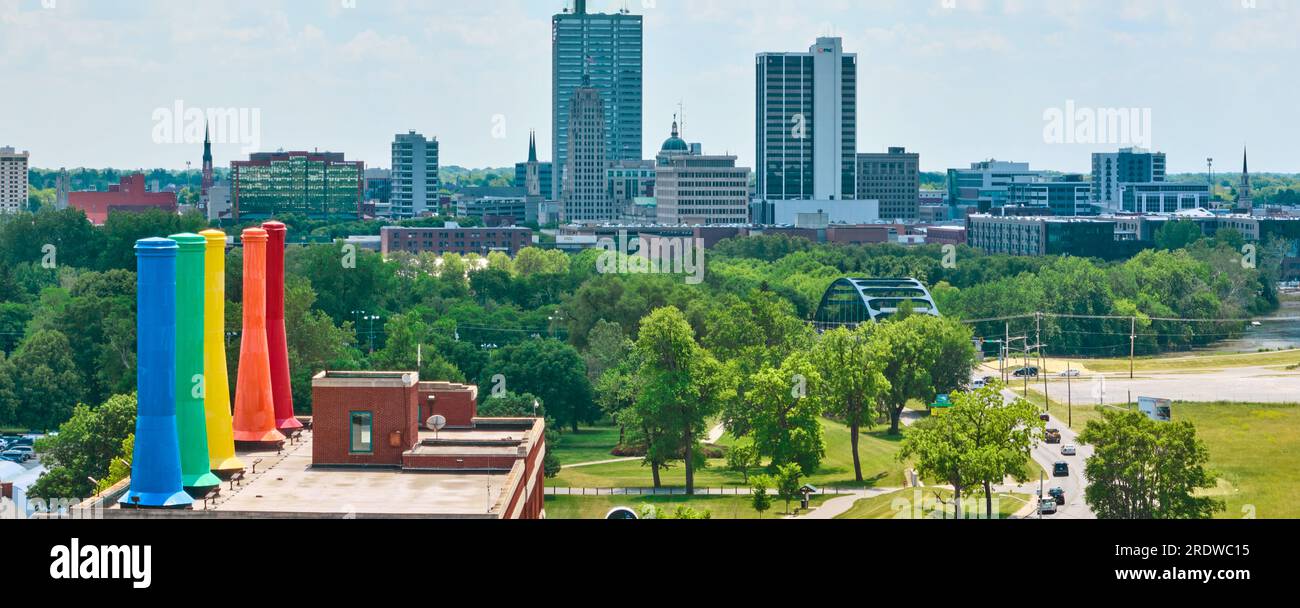 Panorama roof of Science Central with rainbow smokestacks and downtown