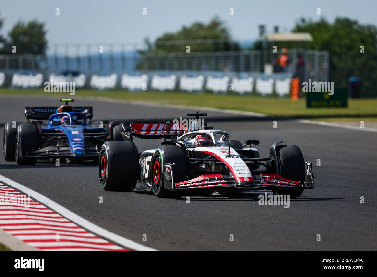 20 MAGNUSSEN Kevin (den), Haas F1 Team VF-23 Ferrari, 02 SARGEANT Logan (usa), Williams Racing FW45, action during the 2023 Formula 1 Qatar Airways Hungarian Grand Prix, 11th round of the 2023 Formula One World Championship from July 21 to 23, 2023 on the Hungaroring, in Mogyorod, Hungary Stock Photo