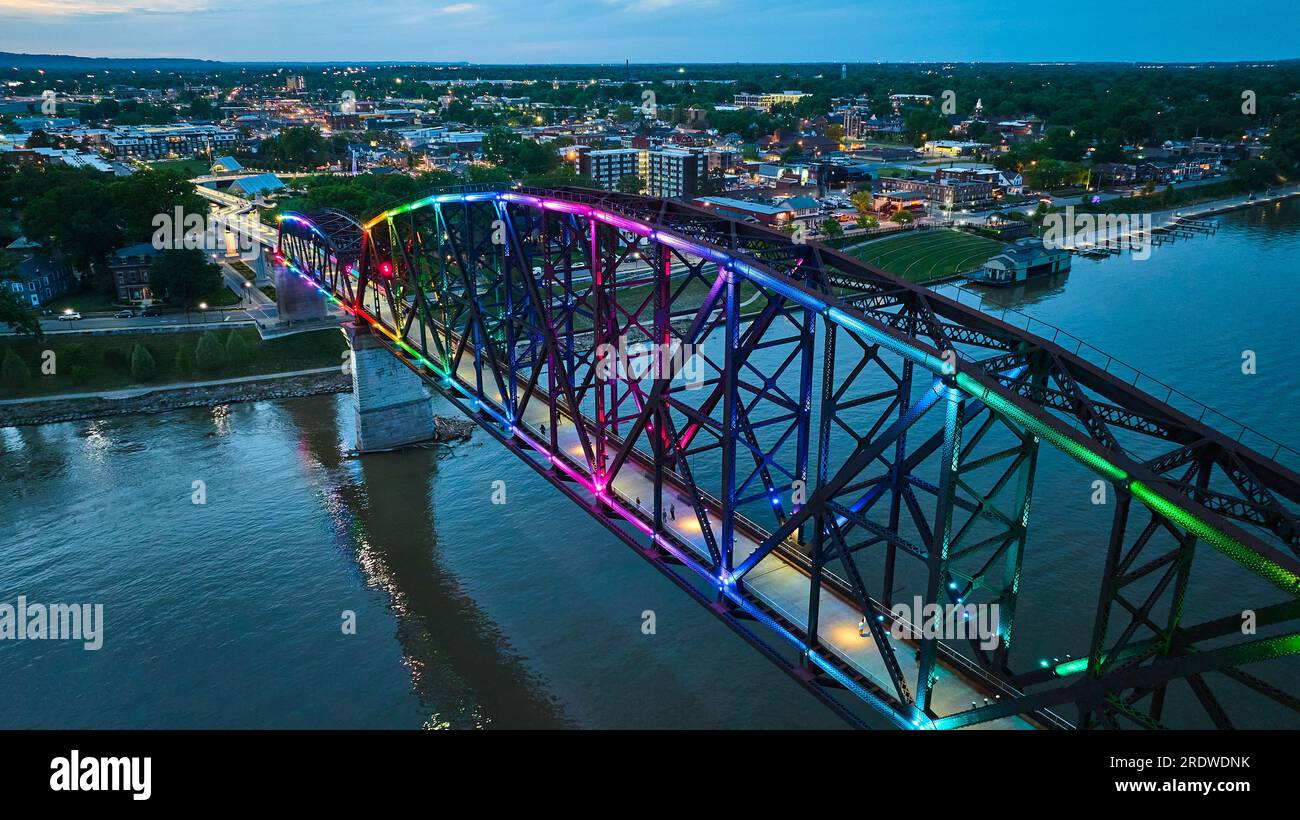 Pride rainbow arch bridge Louisville KY over nighttime Ohio River city