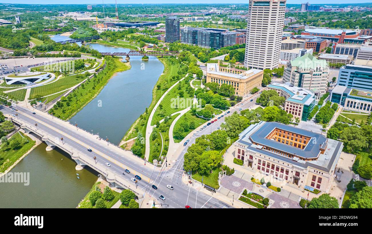 Aerial sky view of river leading out of Columbus Ohio and bridge leading into city Stock Photo