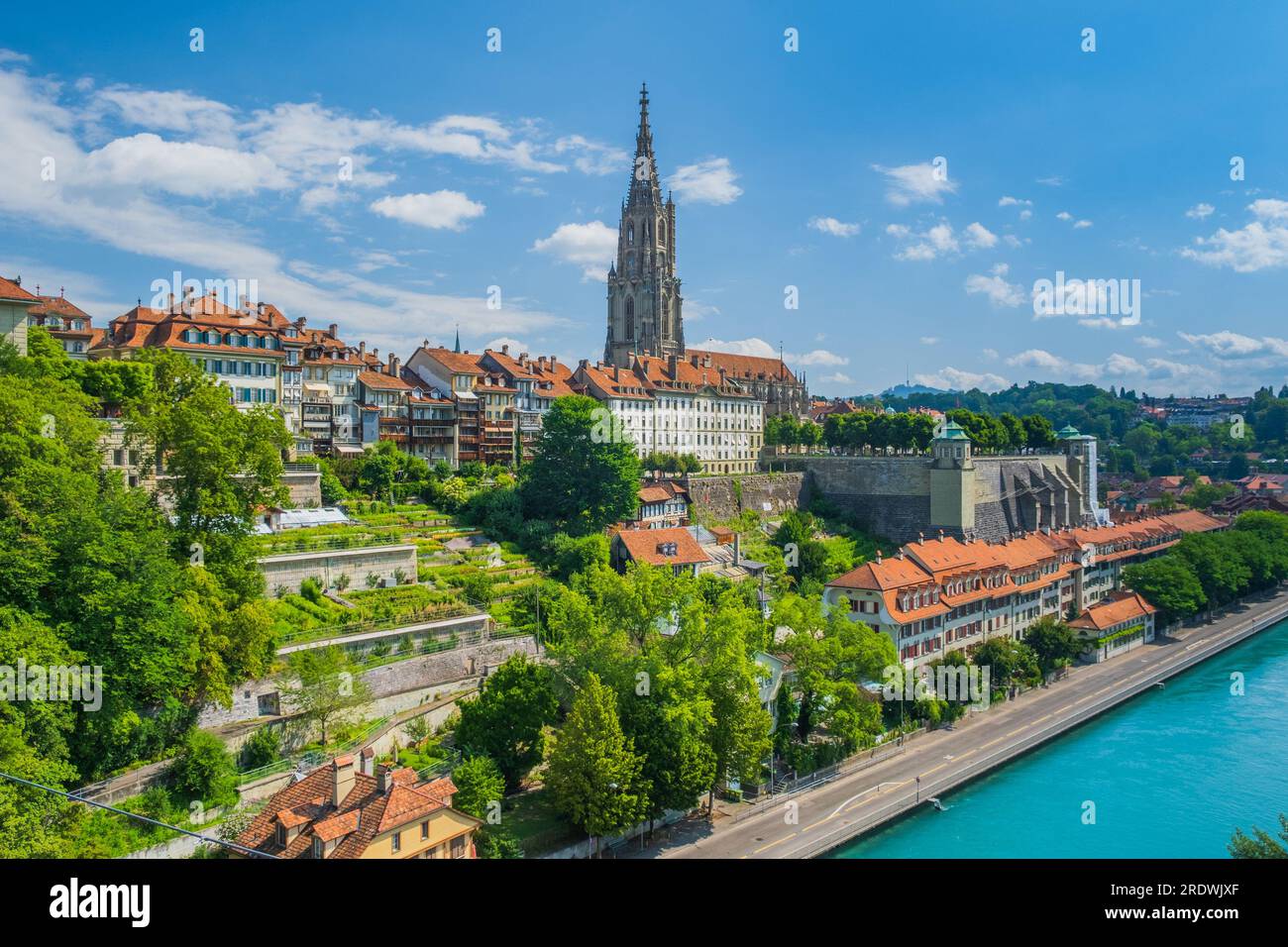 Aare river and Bern Minster, cathedral in the old city of Bern in Switzerland Stock Photo