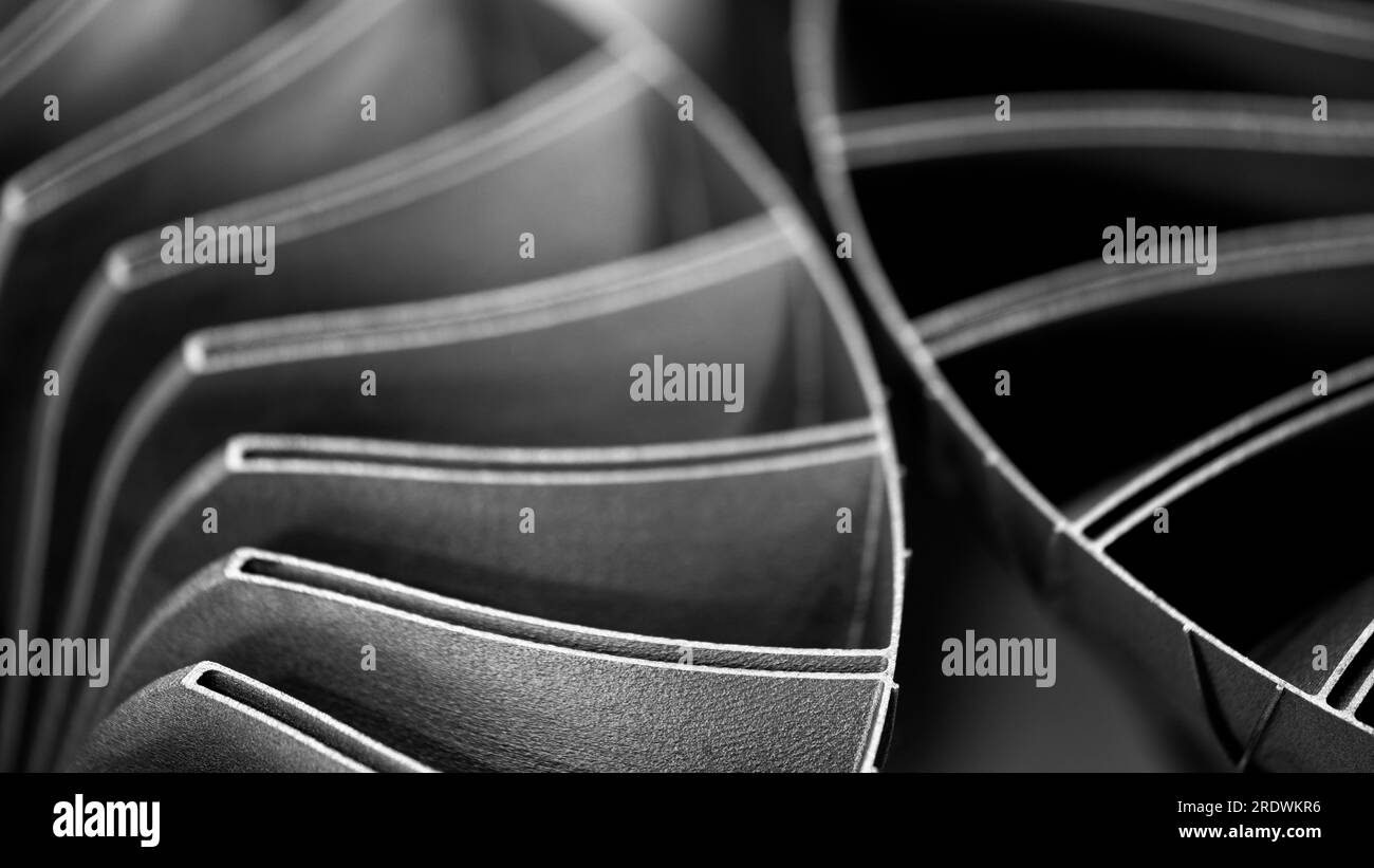 Steel blades of turbine propeller 3D printing. Close-up view. Selected focus on foreground, industrial additive technologies concept Stock Photo