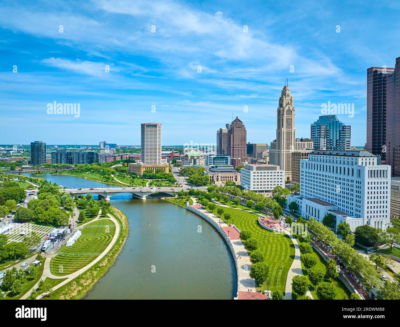 Aerial freshly mowed green park lawns on both sides of Scioto River downtown Columbus Ohio Stock Photo