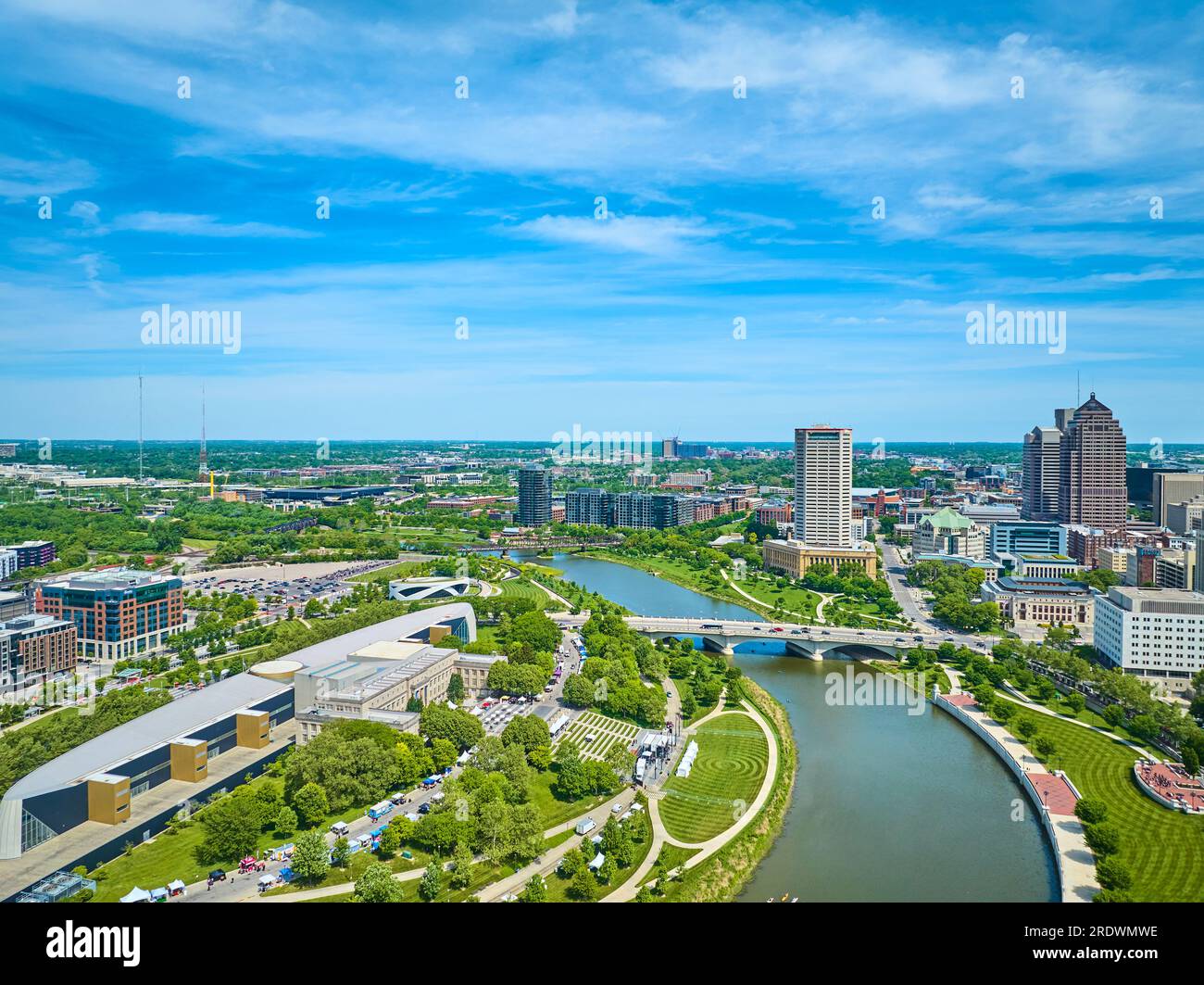 Aerial both sides of Scioto River in downtown Columbus Ohio with Center of Science and Industry Stock Photo