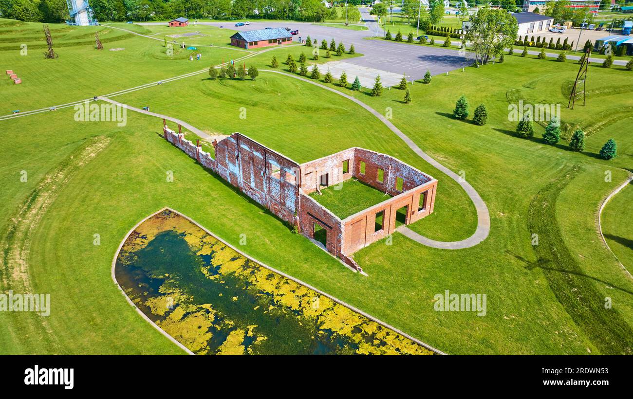 Aerial Ariel Foundation Park with dirty pond and hollowed out remnants ...