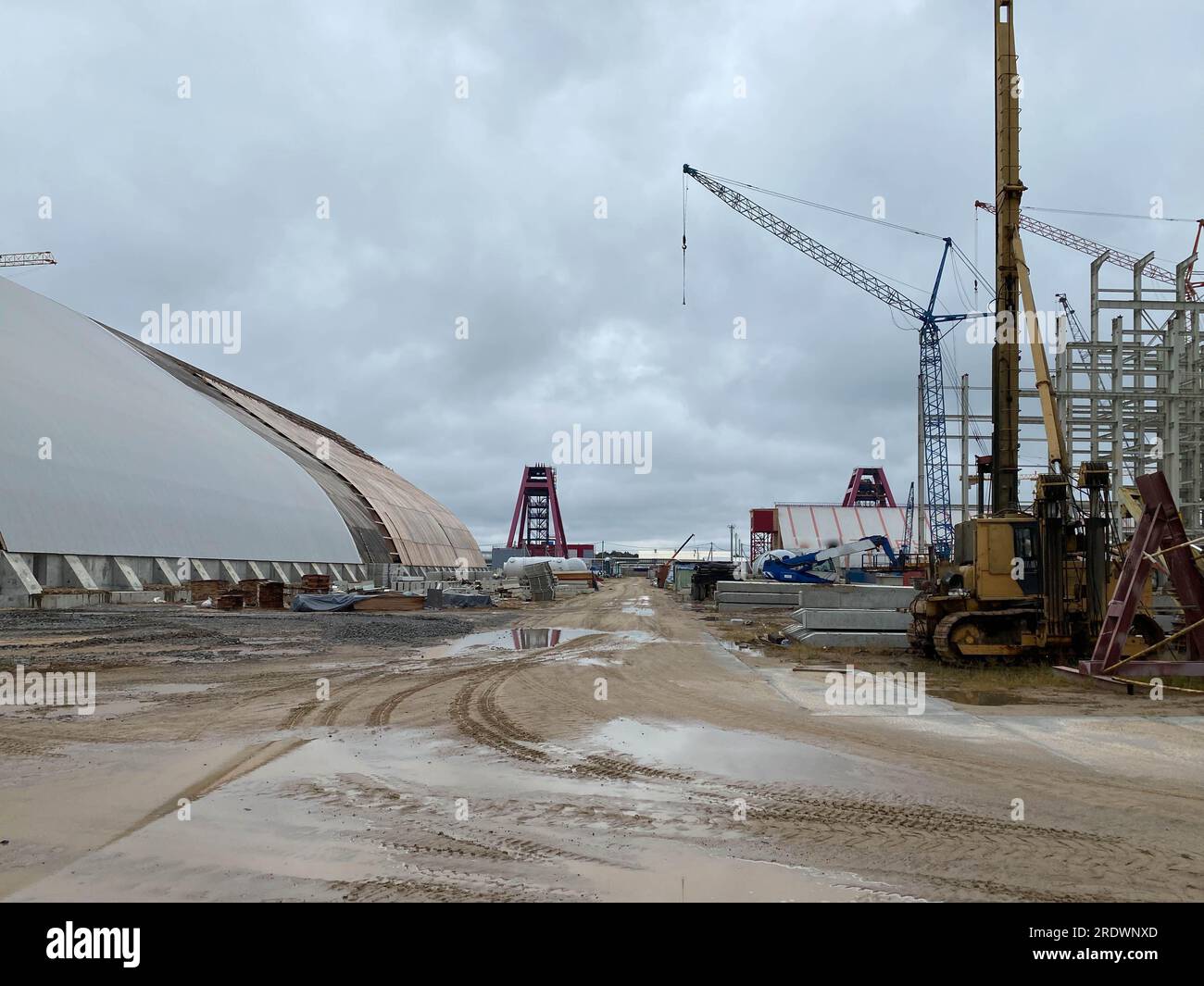 Industrial plant metal containers and cranes in the infrastructure of ...