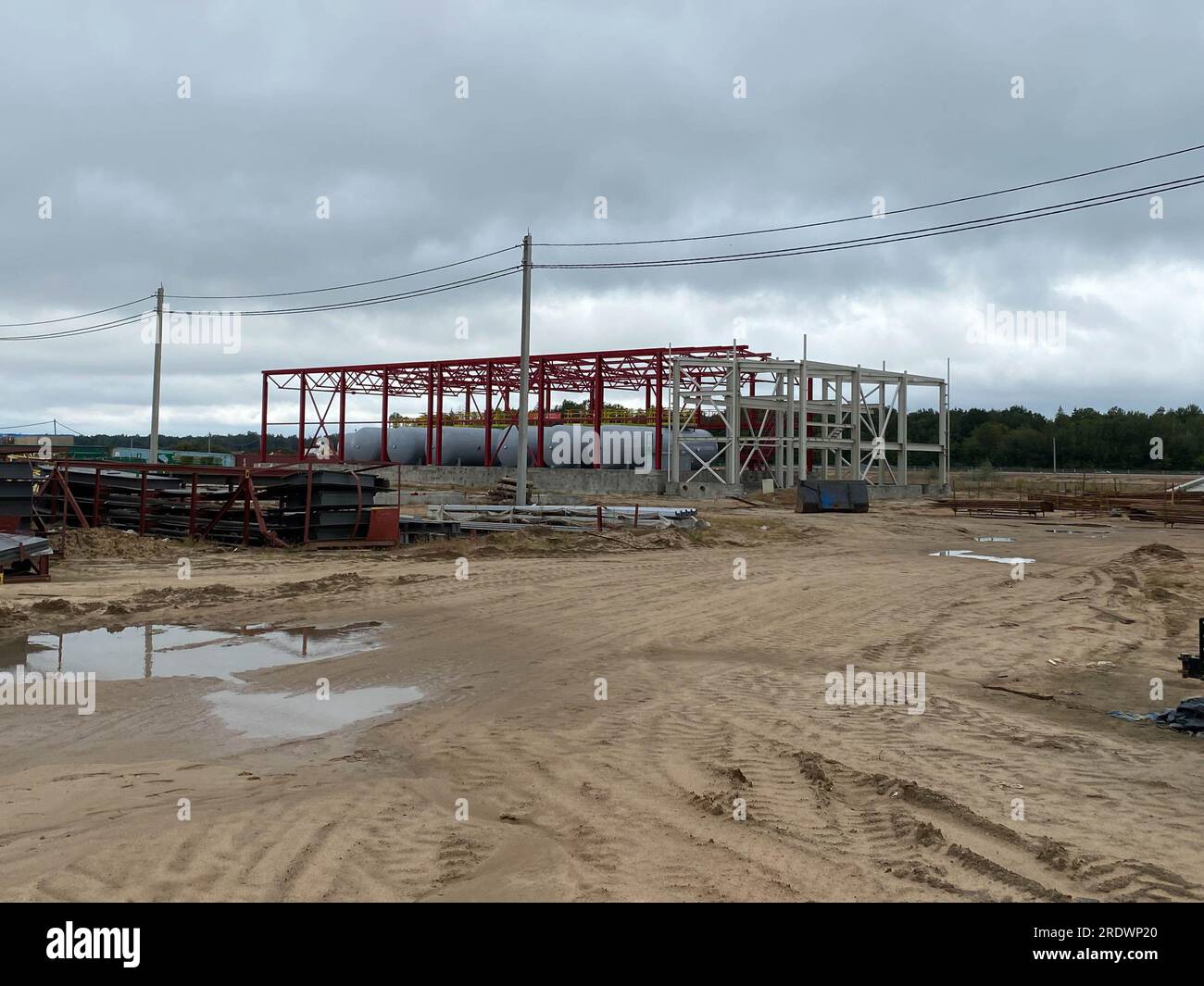 Building construction copyspace on the sky toned colorized image. Construction site. Modern building under construction. Stock Photo