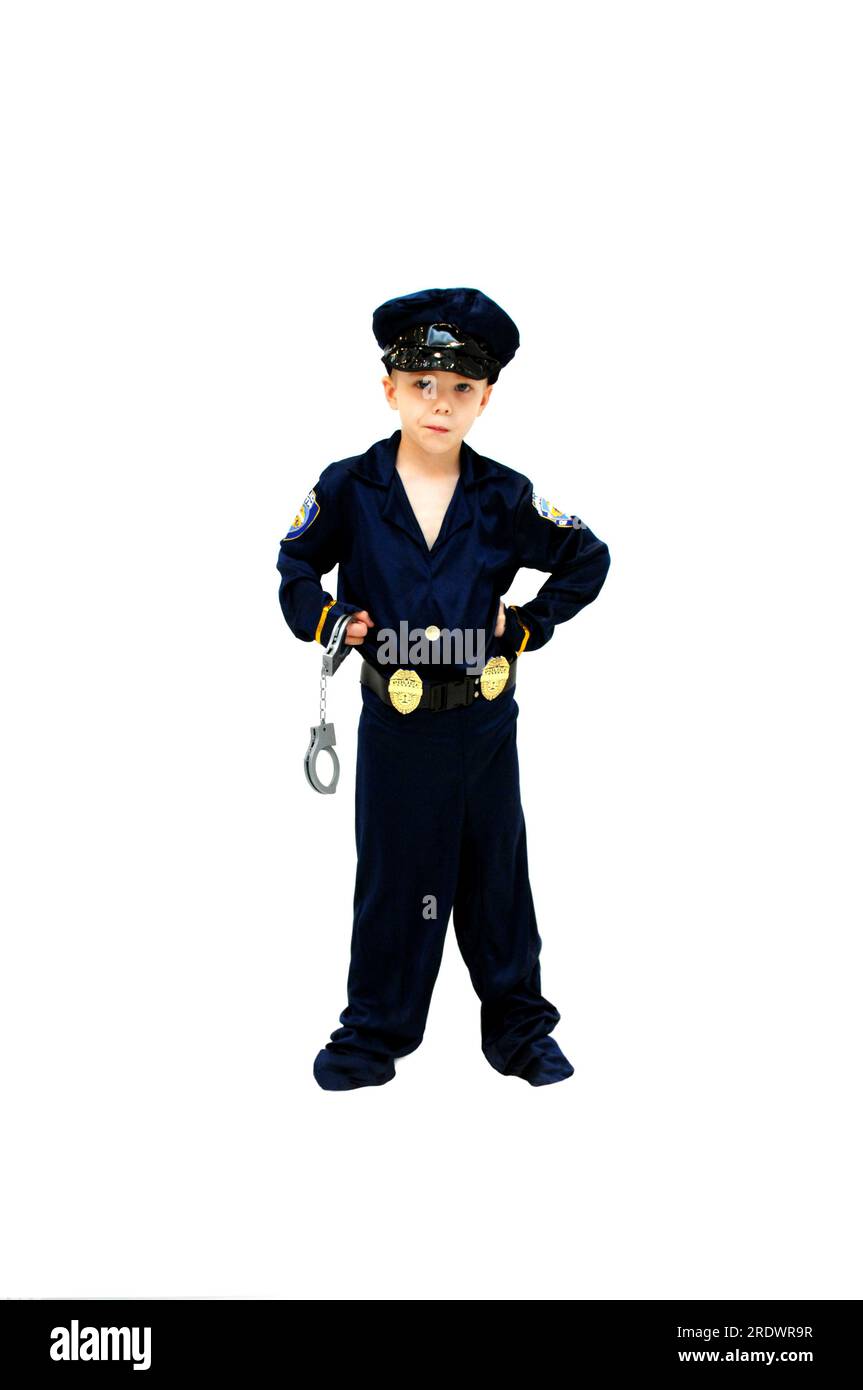 Little boy, dressed as a police officer, is ready to make any arrest