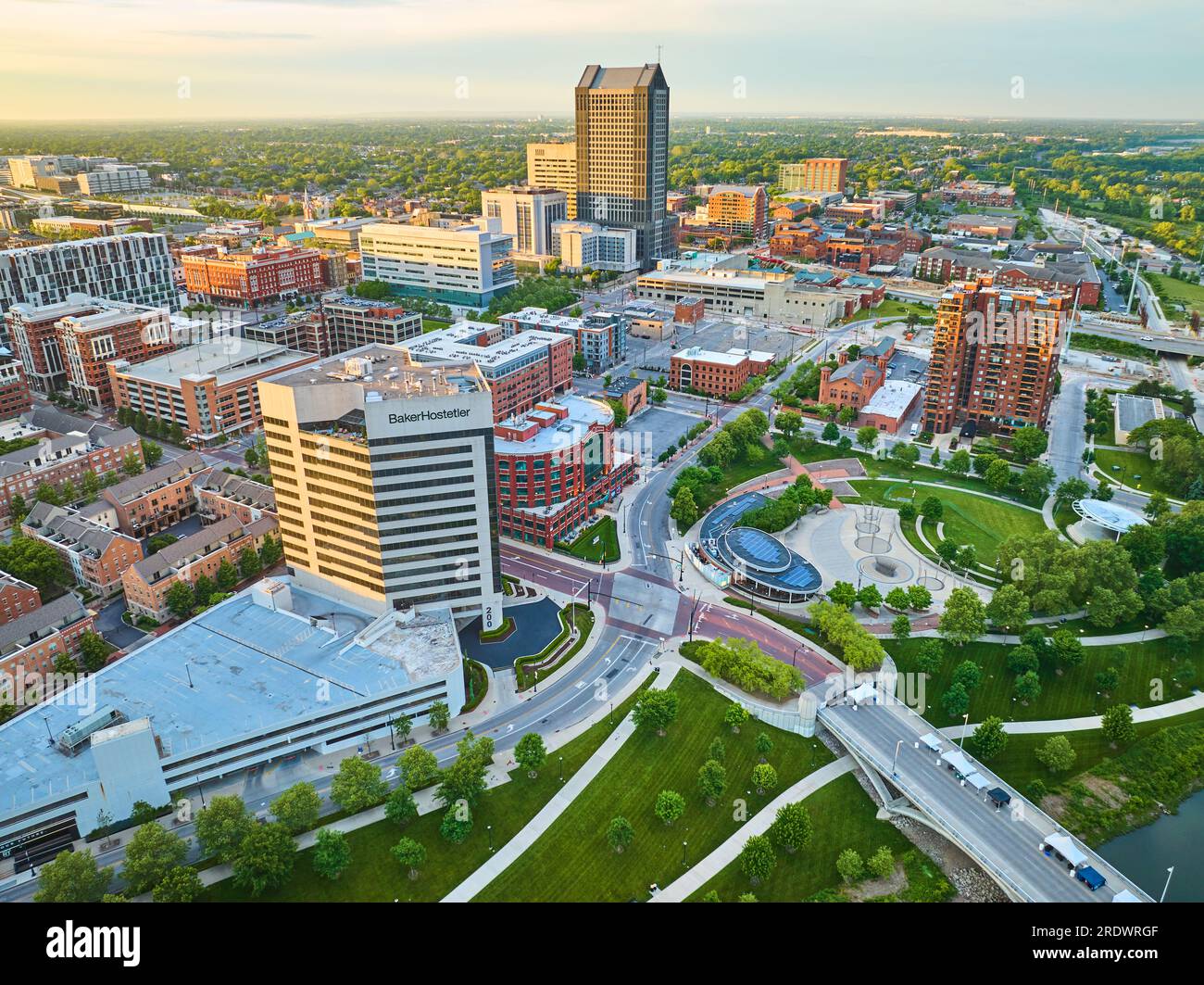 Aerial Columbus Ohio with skyscrapers and apartment buildings and small park at sunrise Stock