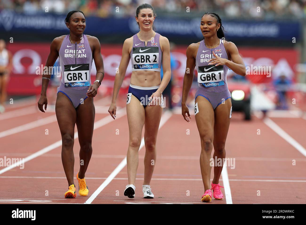 Great British Women Relay runners walking back to the stat line in the