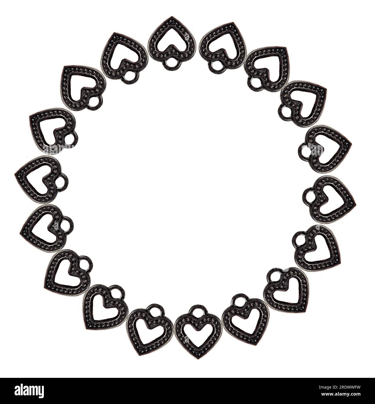 Metal looped hearts laid out in a circle Stock Photo - Alamy