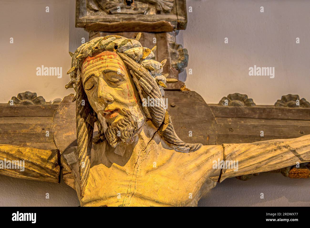 the crucifixion, an old wooden sculpture, Sweden, July 19, 2023 Stock Photo