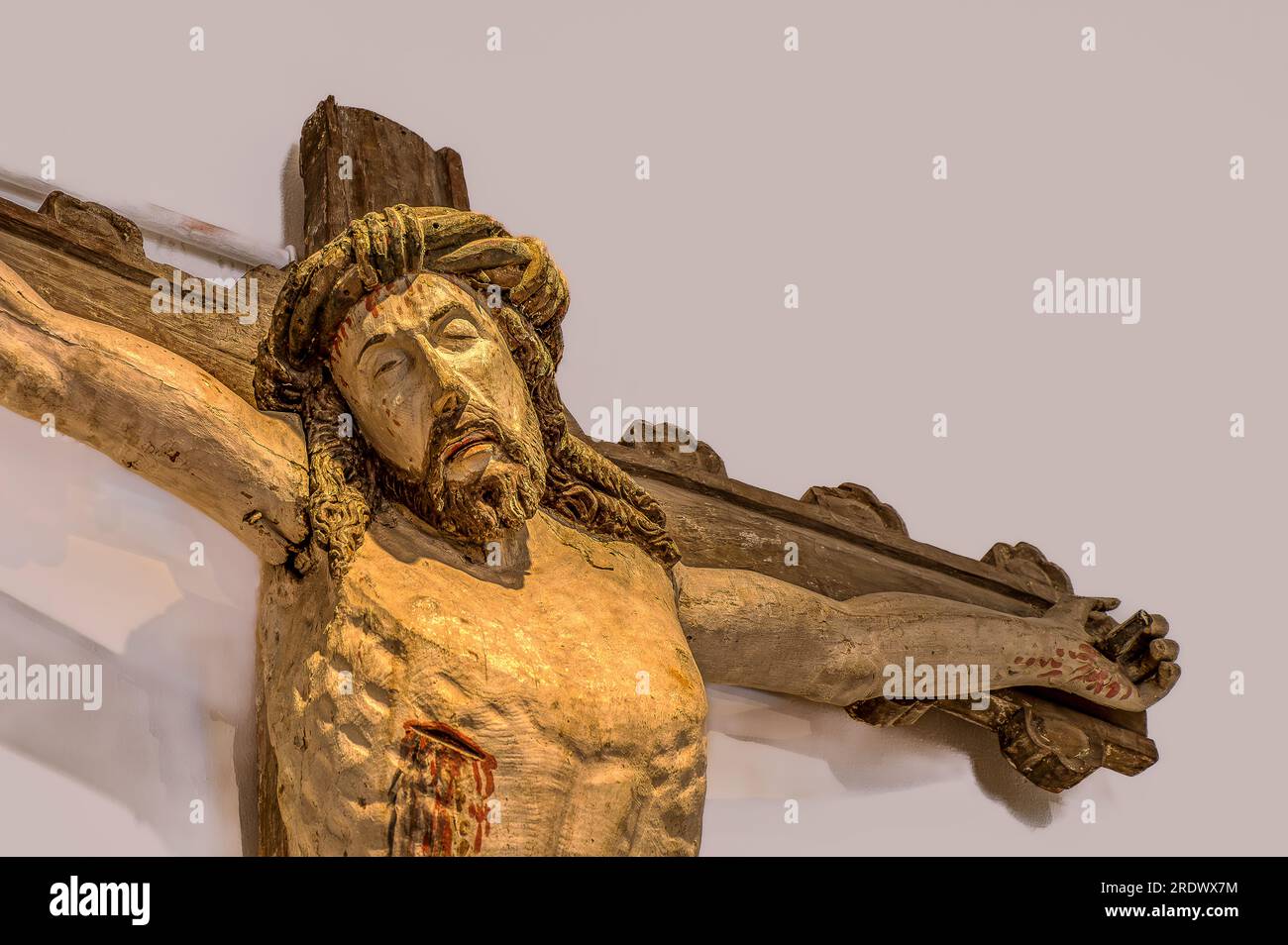 Christ suffering on the cross, a wooden sculpture, Sweden, July 19, 2023 Stock Photo